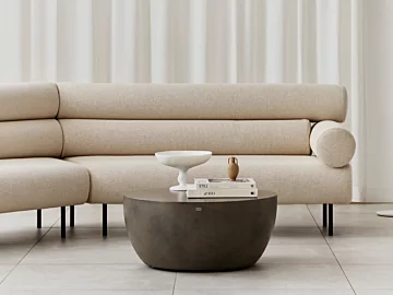 Blinde Design Curv 30 Coffee Table anchors a private residence living room, serving as a modern centrepiece for stylish décor.